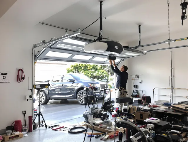 Pataskala Garage Door Repair specialist installing smart garage door opener system in Pataskala home