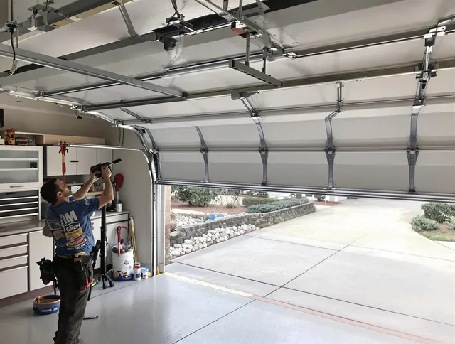 Garage door track repair service by Pataskala Garage Door Repair in Pataskala